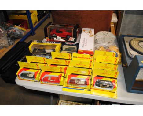 A quantity of Shell Classic Sportscar Collection; a Millenium Falcon; model trebuchet; model Formula I cars; a Maisto Ferrari