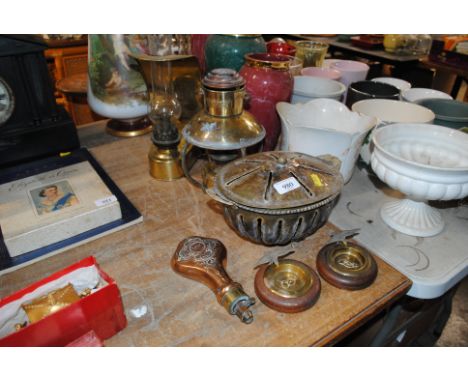 A brass oil lamp together with a Dutch brass hanging oil lamp; a pair of ashtrays decorated with eagles; a powder flask etc.