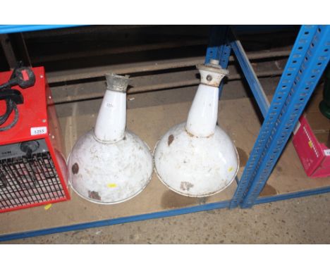 A pair of white enamel Trysteel light fittings