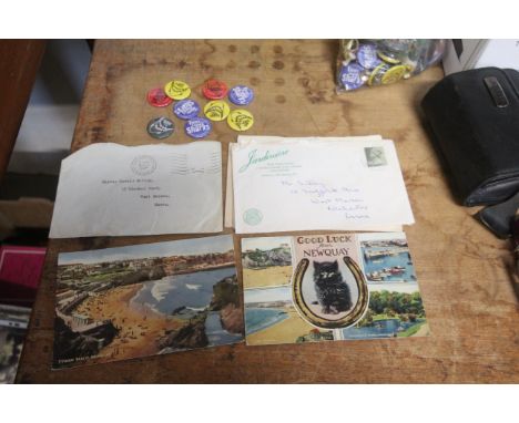A collection of vintage badges and ephemera 