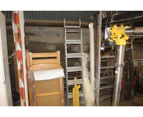An aluminum folding ladder, a wooden T square and car warning triangle 