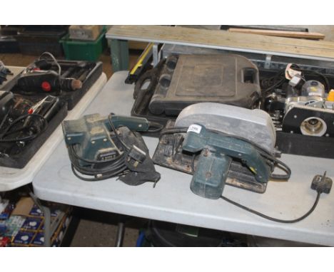 A Black & Decker rip saw together with a Black & Decker belt sander