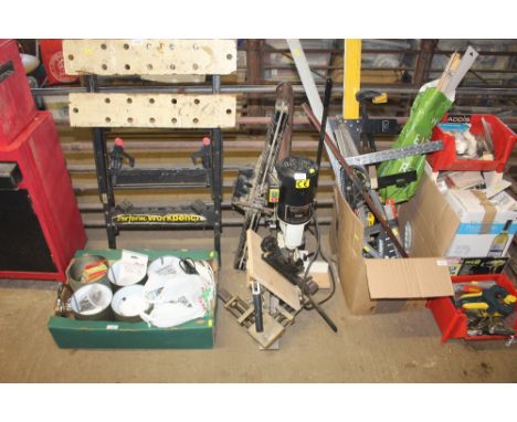 An Axeminster bench top chisel mortiser with various guides, vices and attachments