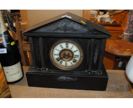A Victorian slate eight-day mantel clock