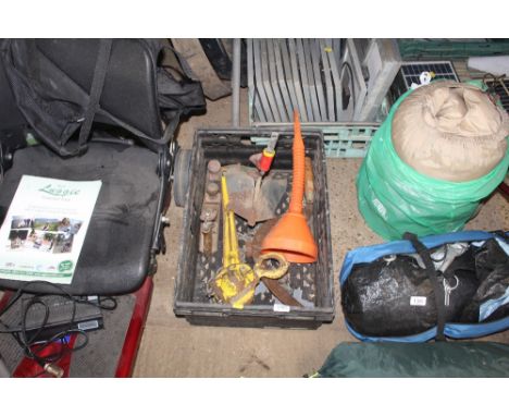 A box containing various tools including a Woolf Garten plough attachment, a hand scythe, two smoothing planes, a Yale 3/4 To