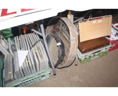 A plastic sieve together with a vintage sieve