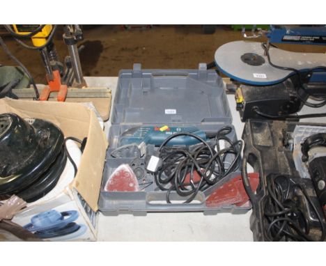 A Bosch sander in fitted case