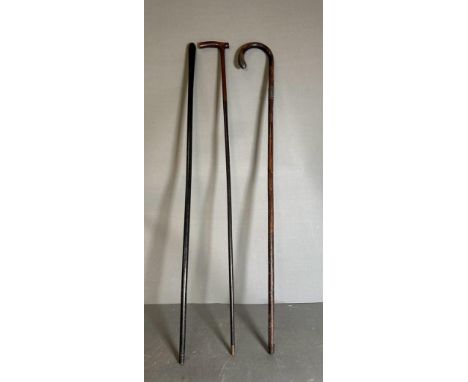 A selection of three vintage walking canes 