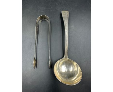 A silver sauce ladle by Goldsmiths & Silversmiths Co Ltd London 1913 and a set of Georgian silver sugar nips by Alice & Georg