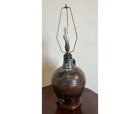 A Studio pottery table lamp in the form of a jug, glazed brown ground with blues