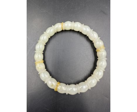 A Jade Bangle, 8cm in diameter.