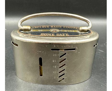 A Vintage Barclays Bank Limited Home Safe with coins but no key. Has not been opened by Windsor Auctions.