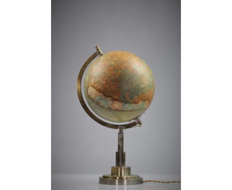 PAUL DUPRE-LAFON (1900-1971) LUMINOUS EARTH GLOBE â€“ Circular stepped base from which rises an architectural shaft housing a