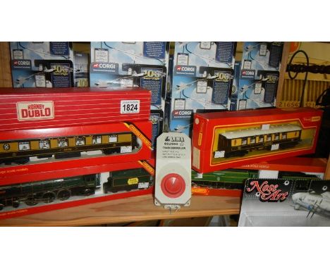 2 boxed Hornby railways steam locomotives:- R.063 BR standard class 7 Britannia and R.374 Southern Battle of Britain class Sp