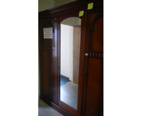 A Victorian compactum wardrobe with mirror & decorative panels