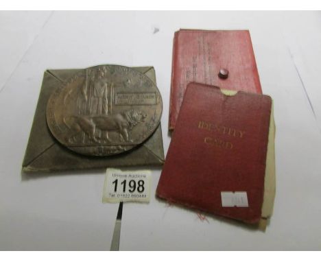 A WW1 death plaque and assorted documents including soldiers pensions 1917, character certificate, certificate of discharge, 