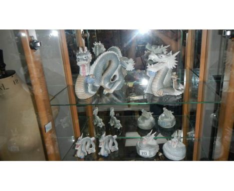 4 Ceramic dragons and 2 pots with dragons on lids.