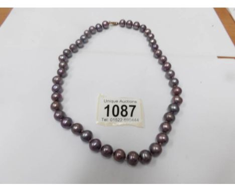 A Honora aubergine pearl necklace.