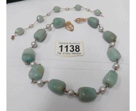 An Adventurine/pearl necklace from British Museum Classical Pieces.