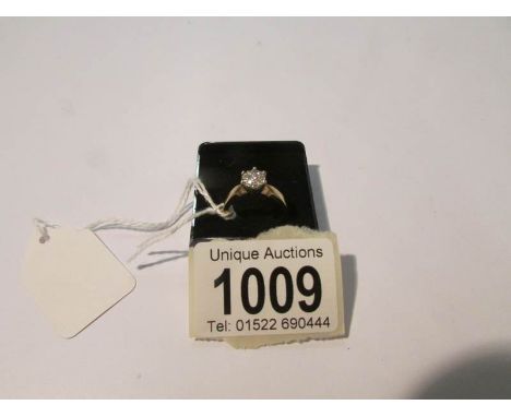A 10 stone yellow gold diamond cluster ring, size K.