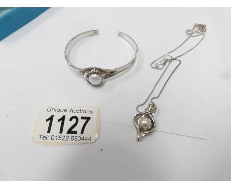 A Hajit Gorali pearl bracelet and necklace.