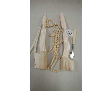 A pair of carved bone figures etc.