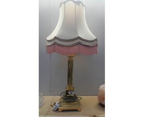 A good quality brass table lamp with shade.