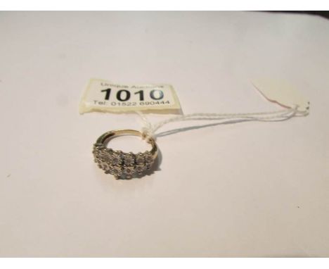 A 14 stone 2 row yellow gold diamond ring, size K.