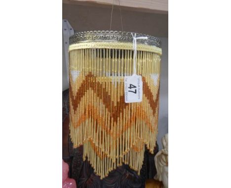 A beaded lamp shade.