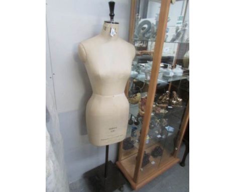 A Kennett & Lindsell Ltd (K & L) Mannequin - series CSI, size 12, with base.