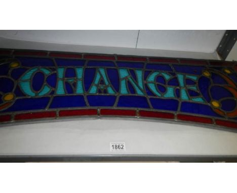 A Victorian leaded 'Change' stained glass panel from Brighton Pier arcade