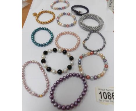 Twelve assorted Honora pearl bracelets.