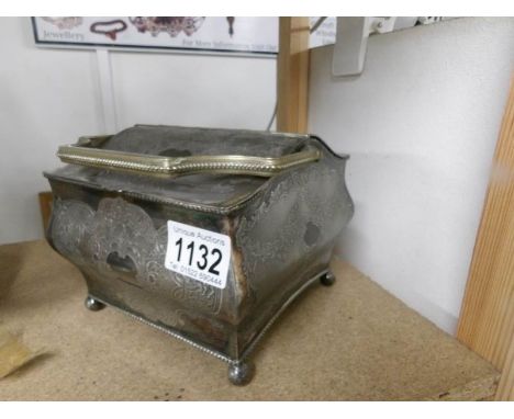 A double sided engraved tea caddy.