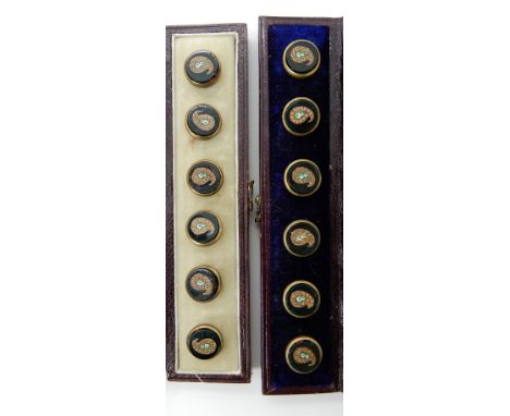 TWO SETS OF PIETRA DURA BUTTONS with a Paisley pattern made from millefiori glass rods on a black ground mounted in base meta