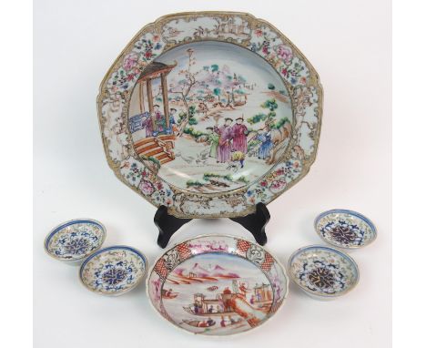 A CHINESE EXPORT SOUP PLATE painted with figures beside a pavilion within a border of landscape vignettes (rim chips), 22.2cm