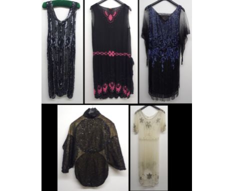 FOUR VINTAGE LADIES SEQUIN AND BEADED EVENING DRESSES  including flapper style dresses, together with a sequined evening cape