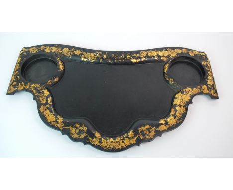 A VICTORIAN PAPIER MACHE AND GILT-DECORATED SUPPER TRAY stamped Jennens & Bettridge, R. Redgrave Reg'd 10th 1847, some damage