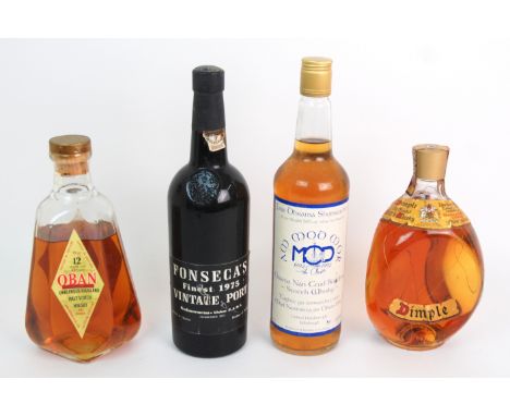 A BOTTLE OF AM MOD MOR BLENDED SCOTCH WHISKYproduced by United Distillers plc. No.588, 70cl, 40% volume, a bottle of Dimple H