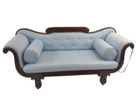 A GEORGE IV MAHOGANY SCROLL BACK SETTEE with upholstered button back, padded seat and scroll arms on leaf carved legs with br