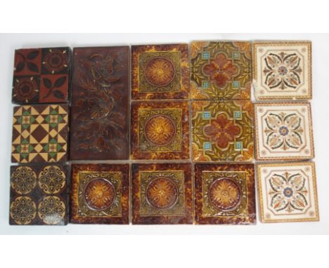 THREE MINTON ENCAUSTIC FLOOR TILES  15cm x 15cm together with twenty Victorian and later glazed tiles (23)   Condition Report