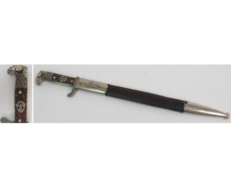 A WWII GERMAN FIREMAN'S BAYONET the two-part stag antler hilt with Eagle and Swastika crest and Eagle's head pommel in steel 