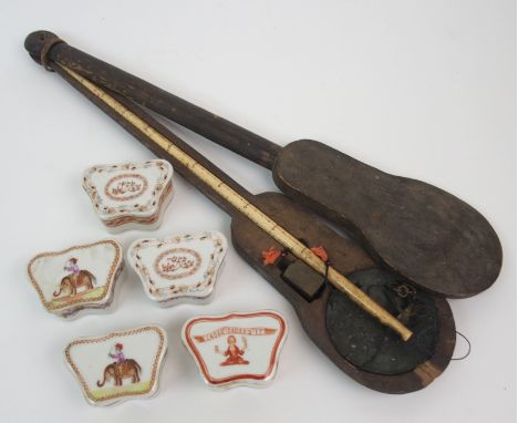 A CHINESE SET OF BONE OPIUM SCALES with metal weight and pans within a boxwood case, 43cm long and five polychrome scroll sha