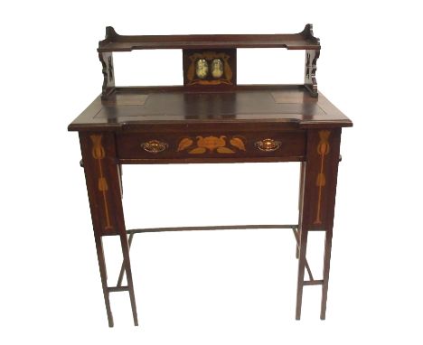 AN ARTS AND CRAFTS MAHOGANY WRITING DESK with single open shelf with inlaid double picture frame, the desk having single inla