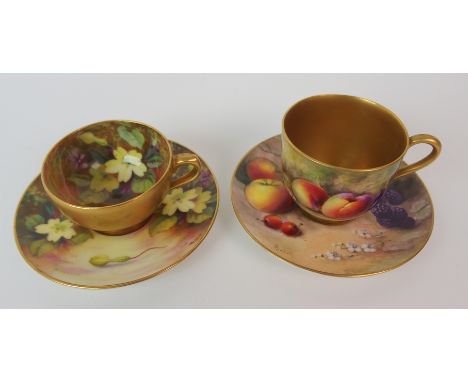 A ROYAL WORCESTER CABINET CUP AND SAUCER painted with fruit and signed Ricketts, circa 1913 together with another example pai