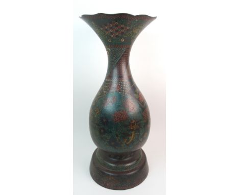 A CHINESE CLOISONNE BALUSTER VASE decorated with panels of flowers and diaper raised on a tripod base (some abrasions to body