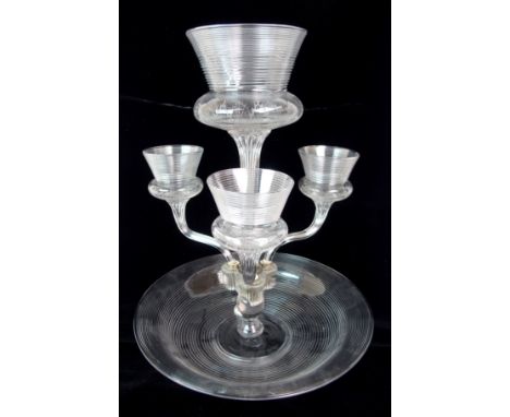 A VICTORIAN GLASS EPERGNE the ribbed glass bowl base with central thistle shaped flute and three smaller flutes, each etched 