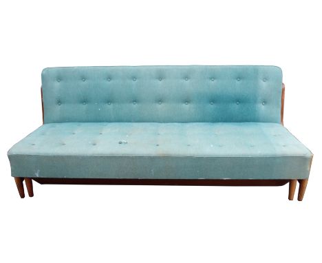 A MID-CENTURY FINNISH SOFA BED with a teak frame, 79cm high x 190cm wide x 130m deep This item is offered for sale as a work 