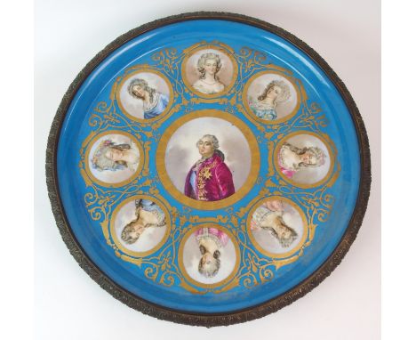 A LARGE SEVRES PATTERN PORCELAIN PLAQUE painted with a portrait of King Louis XVI and eight profile portraits of Ladies of th