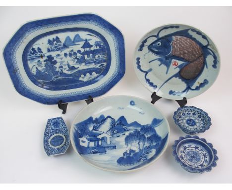 A CHINESE EXPORT BLUE AND WHITE OCTAGONAL ASHET painted with pavilions on islands, 35cm wide, a circular dish, 27cm diameter,