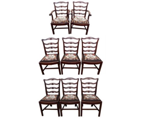 A SET OF EIGHT CHIPPENDALE STYLE REPRODUCTION MAHOGANY DINING CHAIRS with pierced scroll spar backs above drop-in woolwork se
